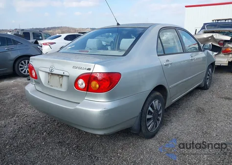 2003 Toyota Corolla Le z USA, uszkodzony, nr VIN JTDBR32E232014838